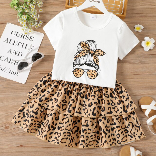 PatPat 2-piece Kid Girl Cartoon Print White Tee and Leopard Print Layered Skirt Set